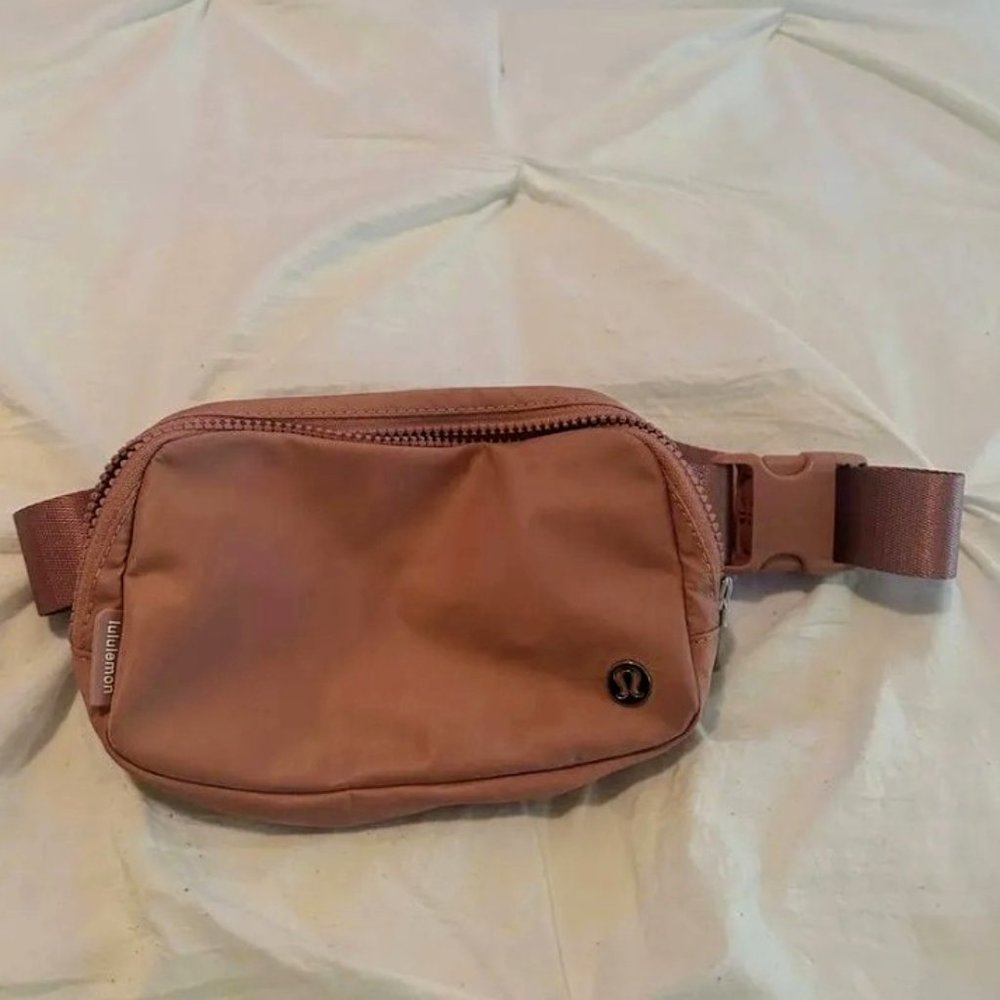 Pink Lululemon belt bag